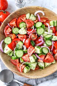Cucumber Tomato Salad is a classic salad, light, crunchy, and refreshing. This simple salad is made with sliced cucumbers & juicy tomatoes and seasoned with red onions and a tangy vinaigrette dressing.