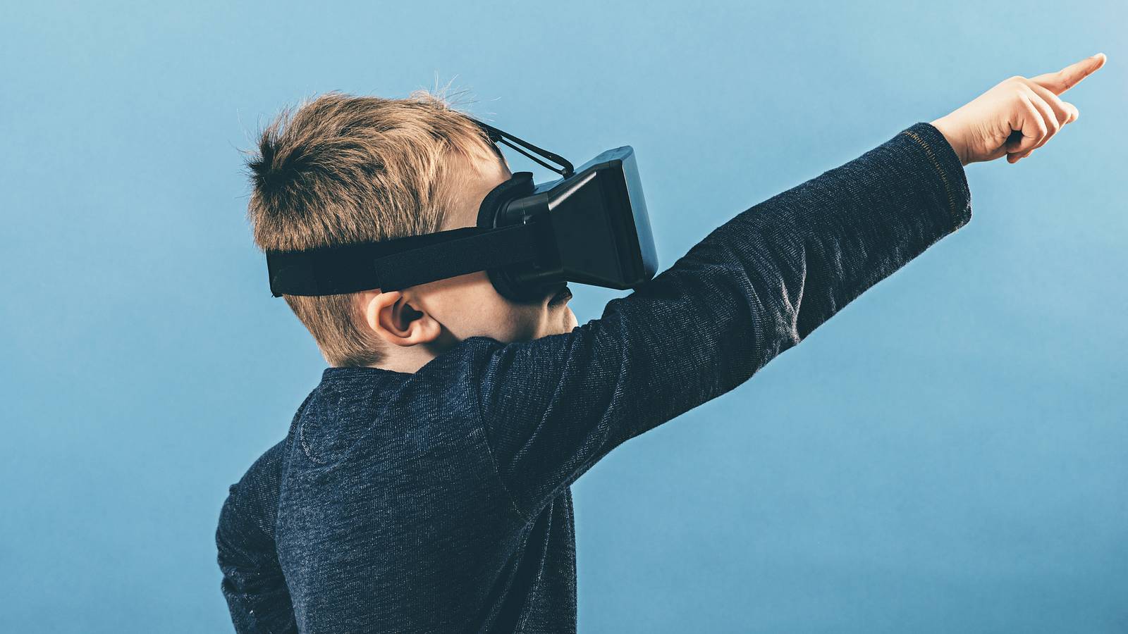Kid playing virtual reality game