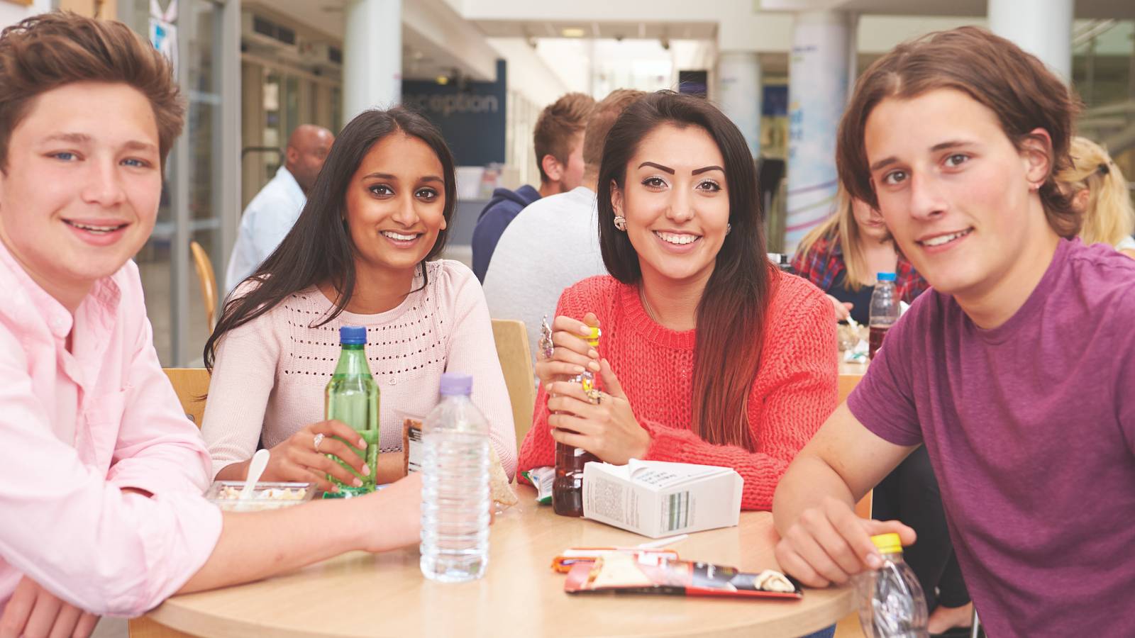 Image of students in the cafeteria at a college. 