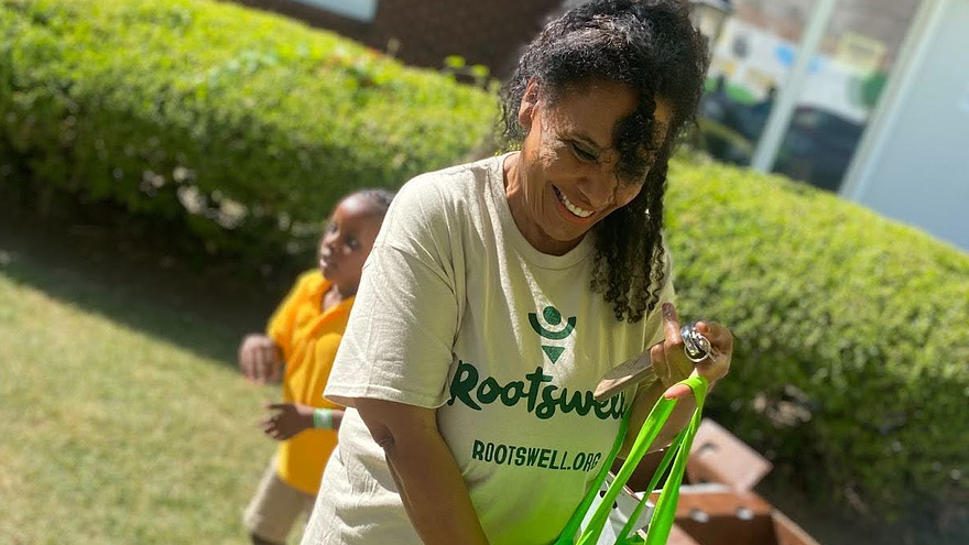 A local resident in the MS Delta, buying fresh produce at Tri-Delta’s new mobile market.