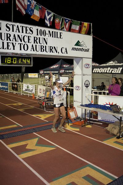 Image of Stephanie M. Howe, PhD, Endurance Runner & The North Face Athlete, at the finish line of a race. 