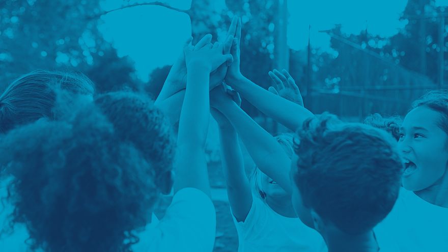 kids group with hands in