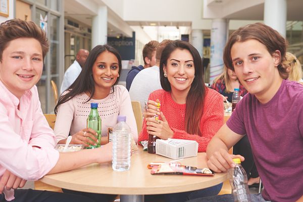 Image of students in the cafeteria at a college. 