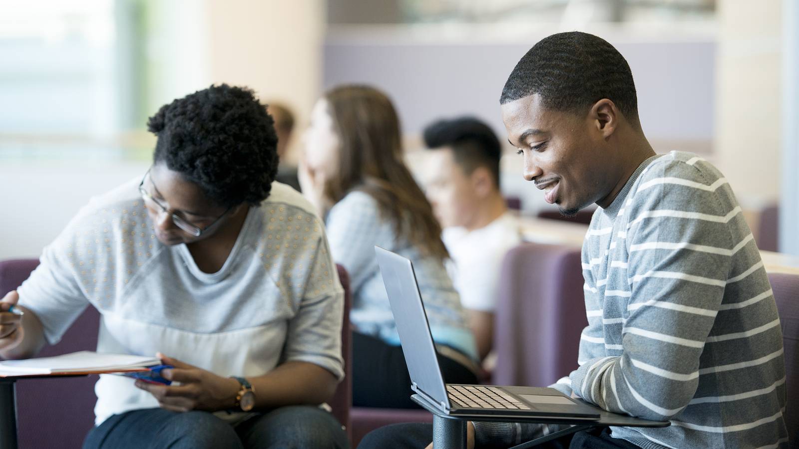 Image of college students studying. 