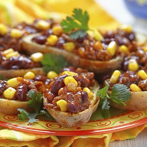 potato topped with turkey and cheese