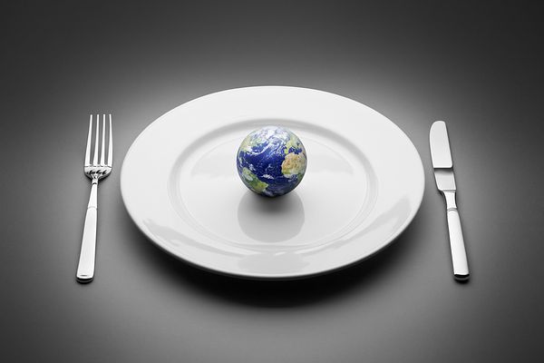 A place setting with the world on the plate.