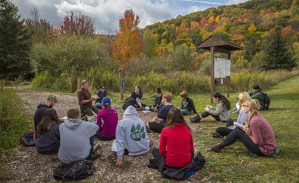 Binghamton University students participating in an outdoor class. Binghamton University is a PHA Healthier Campus Initiative partner committed to creating a healthier environment for its students, faculty and staff.
