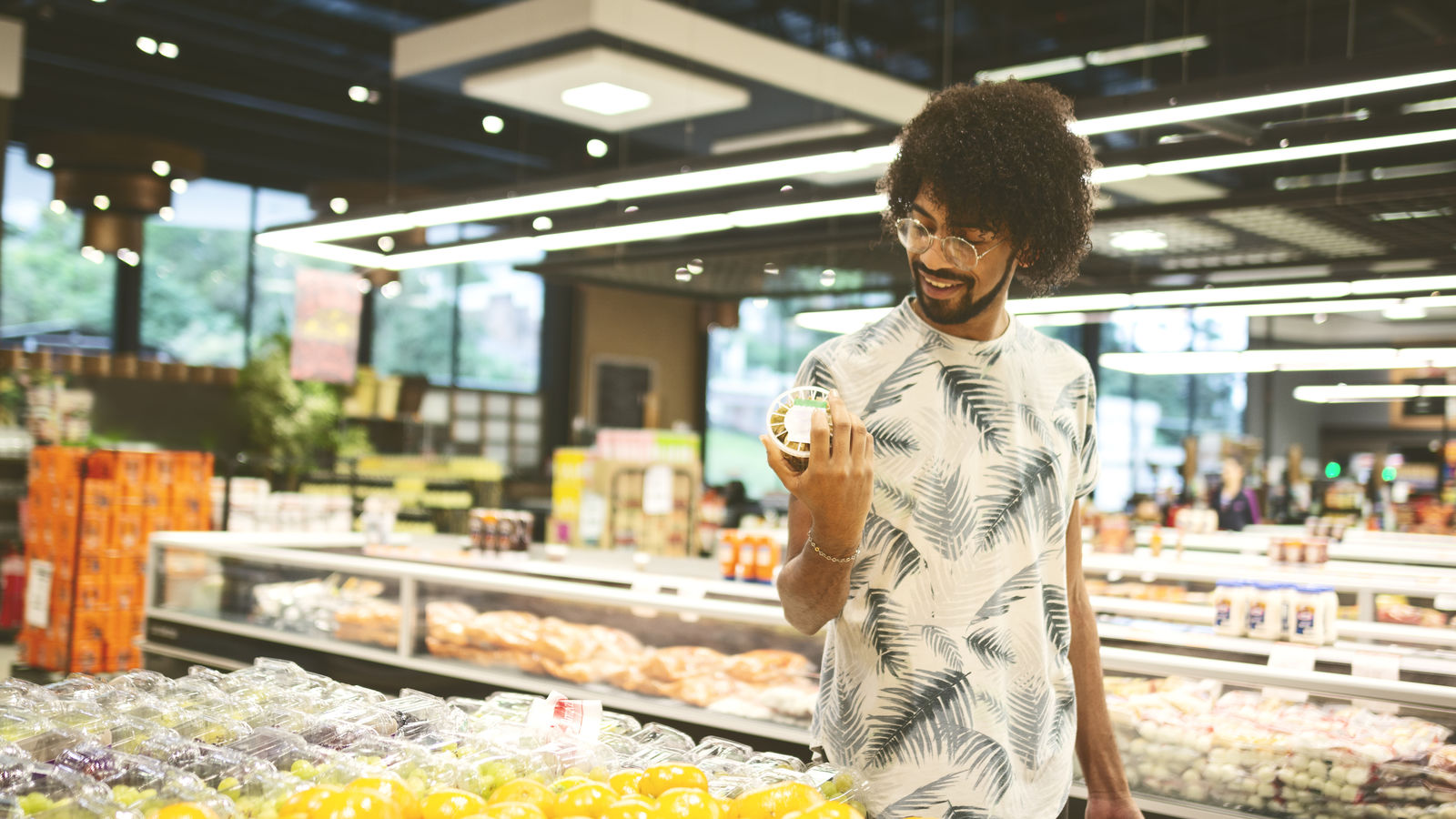 Young man at super market.