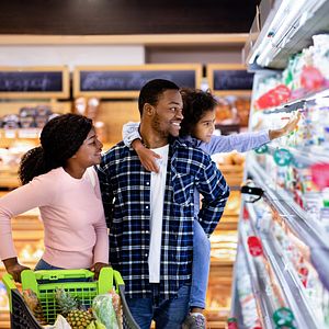A family shops for food together