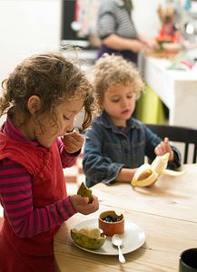 Two kids eating a healthy snack