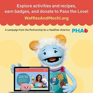 An image of Waffles and Mochi looking at the wafflesandmochi.org website