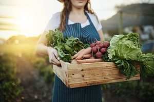 Woman carrying vegetables