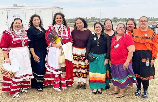 Amy Warne with a group celebrating native heritage
