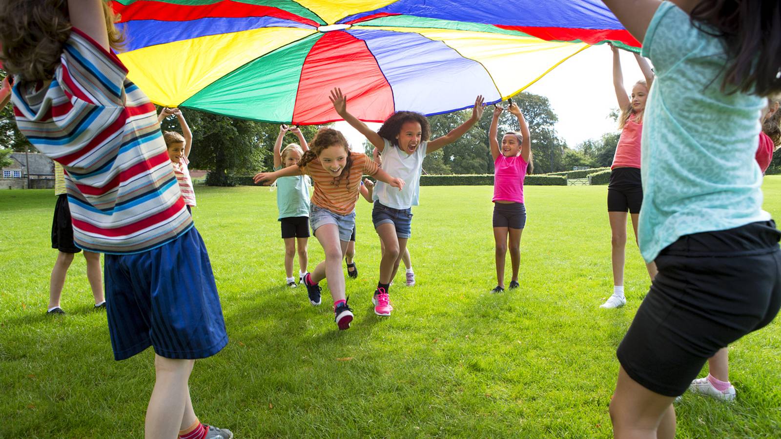 Group of kids playing an outdoor game.
