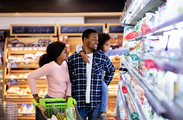 A family shops for food together