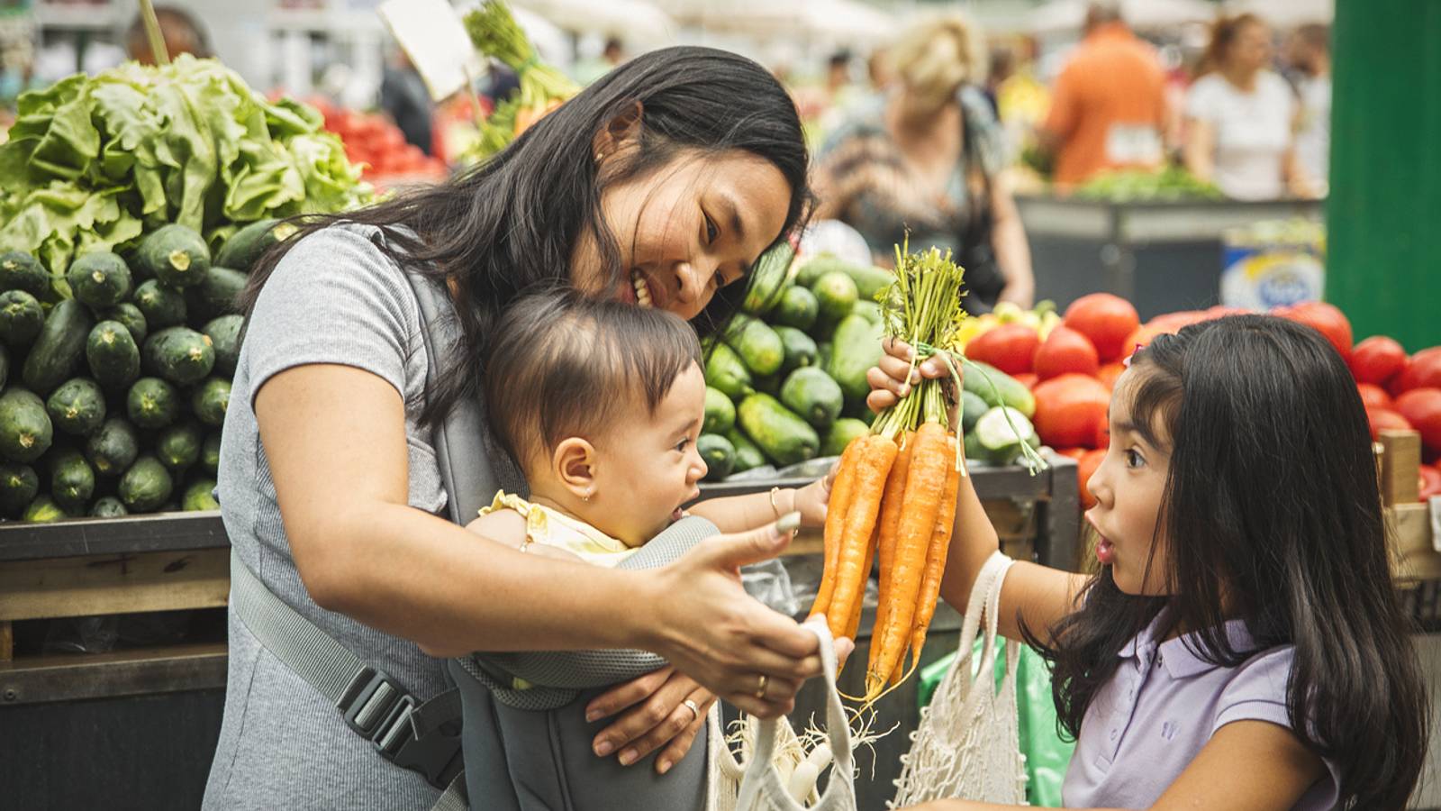 Mom and kids shopping