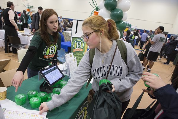 Binghamton University students at a campus health fair. Binghamton is a PHA partner participating in the Healthier Campus Initiative. 
