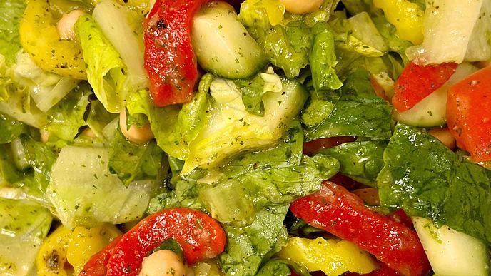 Salad and tomatoes with dressing